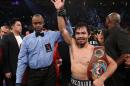 Manny Pacquiao celebrates after his WBO unanimous-decision welterweight victory over Jessie Vargas, at the Thomas & Mack Center in Las Vegas, Nevada, on November 5, 2016