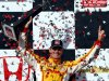 Ryan Hunter-Reay celebrates in Victory Lane after winning the IndyCar Series Grand Prix of Alabama auto race in Birmingham, Ala., Sunday, April 7, 2013. (AP Photo/Butch Dill)