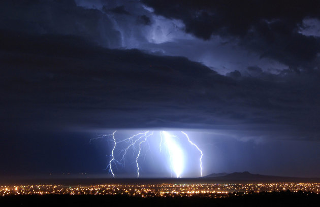 Lightning strikes over Palmdale, Calif., early Tuesday Oct. 19, 2010 as a low pressure system brings unsettled wet weather to Southern California. (AP Photo/Mike Meadows)