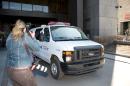 A police van carrying suspect Chiheb Esseghaier leaving Montreal's courthouse on April 23, 2013 in Canada