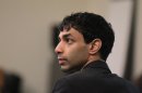 Dharun Ravi listens to testimony during his trial at the Middlesex County Courthouse in New Brunswick, N.J., Tuesday, March 6, 2012. Ravi is accused of using a webcam to spy on his roommate, Tyler Clementi, having an intimate encounter with another man. Days later Clementi committed suicide. Ravi, 19, faces 15 criminal charges, including invasion of privacy and bias intimidation, a hate crime punishable by up to 10 years in state prison. (AP Photo/The Star-Ledger, John O'Boyle, Pool)