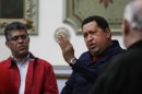 In this photo released by Miraflores Press Office, Venezuela's President Hugo Chavez speaks during a televised program from the Miraflores presidential palace in Caracas, Venezuela, Wednesday April 11, 2012. Chavez returned to Venezuela Wednesday night and said he's 