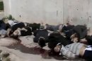 Los cuerpos de unos sirios supuestamente muertos a manos de las fuerzas gubernamentales