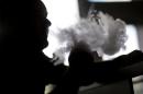 A man smokes an electronic cigarette on February 20, 2014 in Miami, Florida