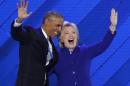 U.S. President Obama and Democratic presidential nominee Clinton appear onstage together after his speech on the third night at the Democratic National Convention in Philadelphia