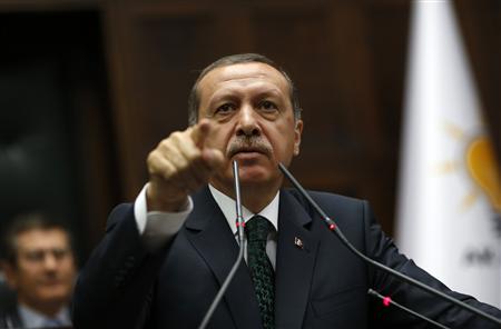 Turkey's Prime Minister Tayyip Erdogan addresses members of parliament from his ruling AK Party (AKP) during a meeting at the Turkish parliament in Ankara June 25, 2013. REUTERS/Umit Bektas