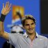 Roger Federer of Switzerland celebrates defeating Nikolay Davydenko of Russia in their men's singles match at the Australian Open tennis tournament in Melbourne