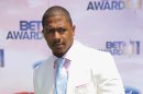FILE - In a Sunday, June 26, 2011 file photo, Nick Cannon arrives at the BET Awards, in Los Angeles. Cannon said in a statement on the 92.3 NOW website that Friday, Feb. 17, 2012 was his last day hosting his New York City radio show, called 