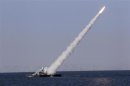New medium-range missile is fired from naval ship during Velayat-90 war game on Sea of Oman near Strait of Hormuz in southern Iran