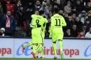 FC Barcelona's Lionel Messi of Argentina, left, celebrates with Luis Suarez of Uruguay, center, after scoring against Athletic Bilbao during their La Liga soccer match, at San Mames stadium in Bilbao, northern Spain, Sunday, Feb. 8, 2015. (AP Photo/Alvaro Barrientos)