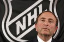 NHL commissioner Gary Bettman listens as he meets with reporters after a meeting with team owners, Thursday, Sept. 13, 2012 in New York. The current collective bargaining agreement between the league and the players expires Saturday at midnight. (AP Photo/Mary Altaffer)