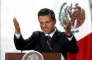 Mexico's President Enrique Pena Nieto delivers a speech during the 78th anniversary of the expropriation of Mexico's oil industry in Mexico City