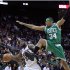 Boston Celtics' Paul Pierce (34) defends New Jersey Nets' DeShawn Stevenson (92) during the first quarter of an NBA basketball game in Newark, N.J., Saturday, April 14, 2012. (AP Photo/Mel Evans)