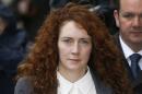 Rebekah Brooks arrives at The Old Bailey law court in London, Thursday, Oct. 31, 2013. Former News of the World national newspaper editors Rebekah Brooks and Andy Coulson are due to go on trial Monday, along with several others, on charges relating to the hacking of phones and bribing officials while at the now closed tabloid paper. (AP Photo/Kirsty Wigglesworth)