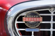 A two million mile badge adorns Irv Gordon's Volvo P1800 in Babylon, N.Y., Monday, July 2, 2012. Gordon's car already holds the world record for the highest recorded milage on a car and he is less than 40,000 miles away from passing three million miles on the Volvo. (AP Photo/Seth Wenig)