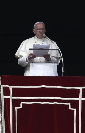 Pope Francis delivers his message from his studio window overlooking St. Peter's Square on the occasion of hishe Angelus noon prayer, at the Vatican, Sunday, Feb. 21, 2016. Francis told tourists and pilgrims in St. Peter's Square Sunday that he is proposing Catholic leaders should "make a courageous and exemplary gesture" and ensure that no convicted inmate is executed during the church's Holy Year of Mercy, which runs through Nov. 20.  (AP Photo/Alessandra Tarantino)