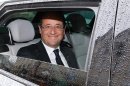 French President Francois Hollande reacts after leaving a restaurant in Tulle, central France, Sunday, June 10, 2012. (AP Photo/Bob Edme)