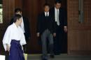 Japan's Internal Affairs and Communications Minister Yoshitaka Shindo leaves after visiting the Yasukuni Shrine in Tokyo