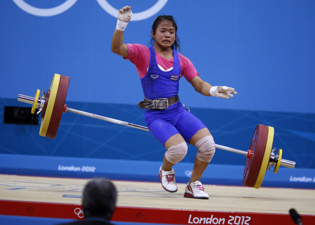 Thailand's Sirivimon Pramongkhol drops weights on the women 48Kg Group A weightlifting competition at the London 2012 Olympic Games