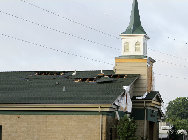 The chapel in the stable area at Churchill Downs in Louisville, Ky., shows roof damage Thursday, June 23, 2011, following a possible tornado that damaged at least nine barns Wednesday night. The Natio
