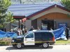 Officials investigate the scene of a shooting in an IHOP restaurant in Carson City, Nev., on Tuesday, Sept. 6, 2011.  A gunman with a rifle opened fire at a International House of Pancakes restaurantkilling three people including two uniformed National Guard members and himself, and wounding six others in a hail of gunfire during the morning breakfast hour, authorities and witnesses said.  (AP Photo/Cathleen Allison)