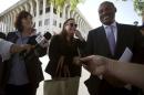 Dominguez, a lawyer for Dr. Melgen, speaks to the media following a court hearing in West Palm Beach