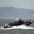 South Korean navy sailors in a speed boat patrol around South Korea's western Yeonpyong Island after finishing their exercise, near the disputed sea border with North Korea, South Korea, Monday, Feb. 20, 2012. South Korea on Monday conducted live-fire military drills from five islands near its disputed sea boundary with North Korea, despite Pyongyang's threat to attack. (AP Photo/Yonhap, Bae Jung-hyun) KOREA OUT