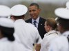 President Barack Obama is greeted at the airport as he arrives to Cartagena, Colombia, Friday April 13, 2012. Obama is in Cartagena to attend the sixth Summit of the Americas.  (AP Photo/Carolyn Kaster)