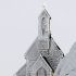 Hikers take pictures near the frost covered Wendelstein church, Germany's highest church, at 1838 meters (6030 feet) on the Wendelstein mountain near Bayrischzell, southern Germany, on Thursday, Feb. 2, 2012. A cold spell has reached central and eastern Europe with temperatures plummeting far below zero. (AP Photo/Matthias Schrader)