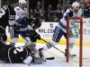 Vancouver Canucks' Kassian scores past Los Angeles Kings' Quick during the first period of their NHL game in Los Angeles, California