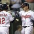 Cleveland Indians' Asdrubal Cabrera is greeted by Ezequiel Carrera (12) after Cabrera's three-run home run in the seventh inning of a baseball game against the Chicago White Sox on Thursday, Sept. 22, 2011, in Cleveland. (AP Photo/Mark Duncan)