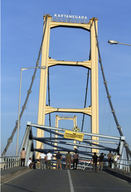 Busy bridge collapses in Indonesia Photos | Busy bridge collapses ...