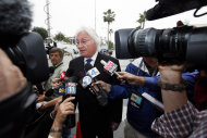 Former Michael Jackson's attorney Thomas Mesereau talks to reporters as he arrives at a courthouse for Katherine Jackson's lawsuit against concert giant AEG Live in Los Angeles, Monday, April 29, 2013. Mesereau is expected to testify during the trial. (AP Photo/Nick Ut)