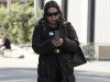 Christina Liew walks out of a federal courthouse in San Francisco, Thursday, March 8, 2012. Liew, who is accused of helping her husband Walter Liew steal trade secrets from DuPont and selling them to a company owned by the Chinese government, pleaded not guilty to economic espionage charges in San Francisco federal court Thursday. (AP Photo/Jeff Chiu)