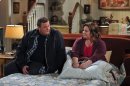 In this image released by CBS, Billy Gardell, left, and Melissa McCarthy are shown in a scene from the sitcom 