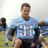 In this July 30, 2011 photo, Tennessee Titans cornerback Cortland Finnegan stretches during NFL football training camp in Nashville, Tenn. Finnegan missed a mandatory team meeting on Saturday, Aug. 6, 2011. His absence was confirmed to The Associated Press by a person familiar with the meeting. The person spoke on condition of anonymity because the team has not commented on Finnegan's status. (AP Photo/Mark Humphrey)