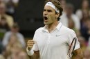 Roger Federer of Switzerland reacts during his men's singles tennis match against Julien Benneteau of France at the Wimbledon tennis championships in London