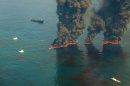 Crews conduct overflights of controlled burns taking place in the Gulf of Mexico in 2010
