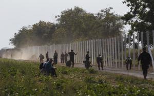 Hungarian soldiers work on a fence that is being built&nbsp;&hellip;