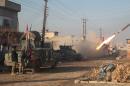 Iraqi forces launch a rocket in Mosul's eastern Al-Intisar neighbourhood on December 30, 2016, during an ongoing military operation against Islamic State (IS) group jihadists