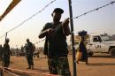 UNMISS personnel erect barbed wire fencing around Tomping camp in Juba