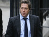British actor Hugh Grant arrives to give evidence at the the Leveson inquiry in London, Monday, Nov. 21, 2011. The Leveson inquiry is Britain's media ethics probe that was set up in the wake of the scandal over phone hacking at Rupert Murdoch's News of the World, which was shut in July after it became clear that the tabloid had systematically broken the law. (AP Photo/Alastair Grant)