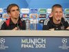 Lahm and Schweinsteiger smile during the Bayern Munich news conference, ahead of the Champions League final soccer match between Bayern Munich and Chelsea in Munich