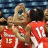 St. John's players celebrate at the end of the second half of an NCAA women's college basketball game against Connecticut at Storrs, Conn., Saturday, Feb. 18, 2012. St. John's defeated Connecticut 57-56. (AP Photo/Bob Child)