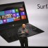 Microsoft CEO Steve Ballmer unveils "Surface", a new tablet computer to compete with Apple's iPad, at Hollywood's Milk Studios in Los Angeles Monday, June 18, 2012. The 9.3 millimeter thick tablet comes with a kickstand to hold it upright and keyboard that is part of the device's cover. It weighs under 1.5 pounds. (AP Photo/Damian Dovarganes)