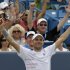 Mardy Fish celebrates after he defeated Rafael Nadal, from Spain, 6-3, 6-4, in a quarterfinal match at the Western & Southern Open tennis tournament, Friday, Aug. 19, 2011 in Mason, Ohio. (AP Photo/Al Behrman)