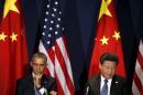 U.S. President Barack Obama meets with Chinese President Xi Jinping at the start of the two-week climate summit in Paris