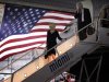 Republican presidential candidate former House Speaker Newt Gingrich accompanied by his wife Callista disembarks from a airplane Friday, Jan. 27, 2012, in Miami, Fla. (AP Photo/Matt Rourke)