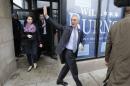 Chicago Mayor Rahm Emanuel waves to supporters as he leaves a campaign office Tuesday, April 7, 2015 in Chicago, as he and his opponent, Cook County Commissioner Jesus "Chuy" Garcia, rally supporters on the morning of the city's mayoral runoff election. It's the first runoff since Chicago switched to non-partisan elections 20 years ago. (AP Photo/M. Spencer Green)