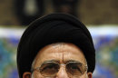 In this Tuesday, Dec. 4, 2007 photo, former Iran's judiciary chief Ayatollah Mahmoud Hashemi Shahroudi attends a conference in Tehran, Iran. Iraqi insiders say Iran's desire to have its own man at the top of Iraq's clerical hierarchy is resting on the shoulders of Grand Ayatollah Mahmoud Hashemi al-Shahroudi. The 63-year-old cleric, they explain, has the pedigree, connections and qualifications to become the next 